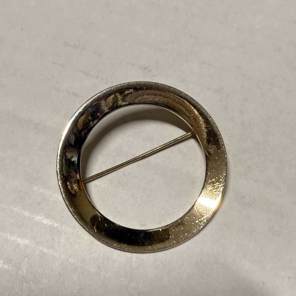 Elegant Gold-Tone Circular Brooch